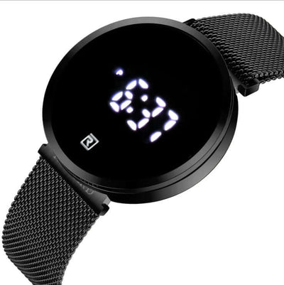 Digital men's wrist watch by BONEHEAD PRO-CREATIONS with luminous display and stainless steel mesh strap.