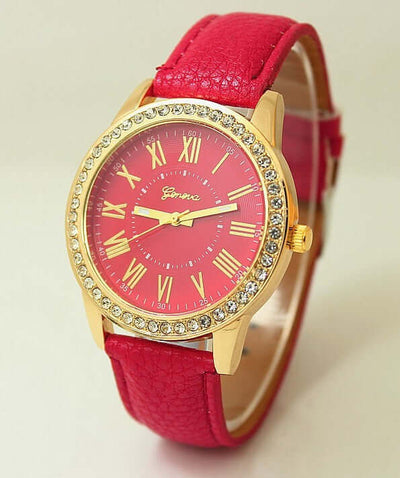 Women's quartz wrist watch with rhinestone, Roman numerals, and red leather band by BONEHEAD PRO-CREATIONS.