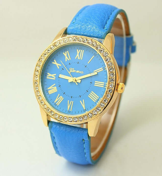Women's Geneva quartz wrist watch with rhinestones and blue imitation leather band by BONEHEAD PRO-CREATIONS.