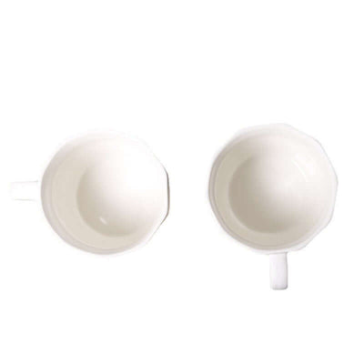 Top view of two diamond shaped ceramic mugs, perfect for retro office decor and modern simplicity.