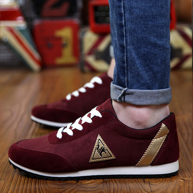Stylish red and gold low-top shoes with white laces, ideal for casual wear, showcasing BONEHEAD PRO-CREATIONS craftsmanship.