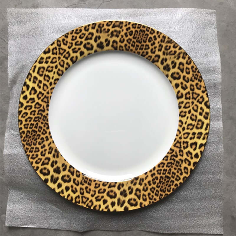 Leopard print dinner plate from luxury bone china tableware collection, featuring a white center and exotic design.
