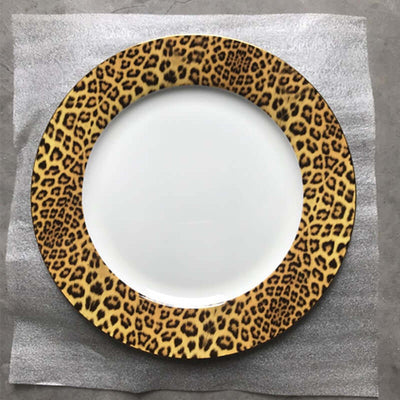 Leopard print dinner plate from luxury bone china tableware collection, featuring a white center and exotic design.