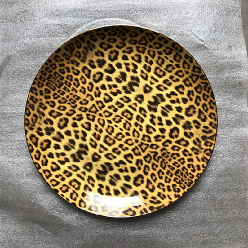 Leopard print dinner plate showcasing luxury bone china design, ideal for elegant table settings.