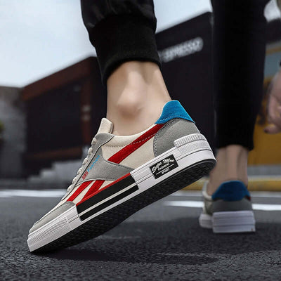 Men's Canvas Sneakers from BONEHEAD PRO-CREATIONS, featuring grey, red, and blue design with a casual style.