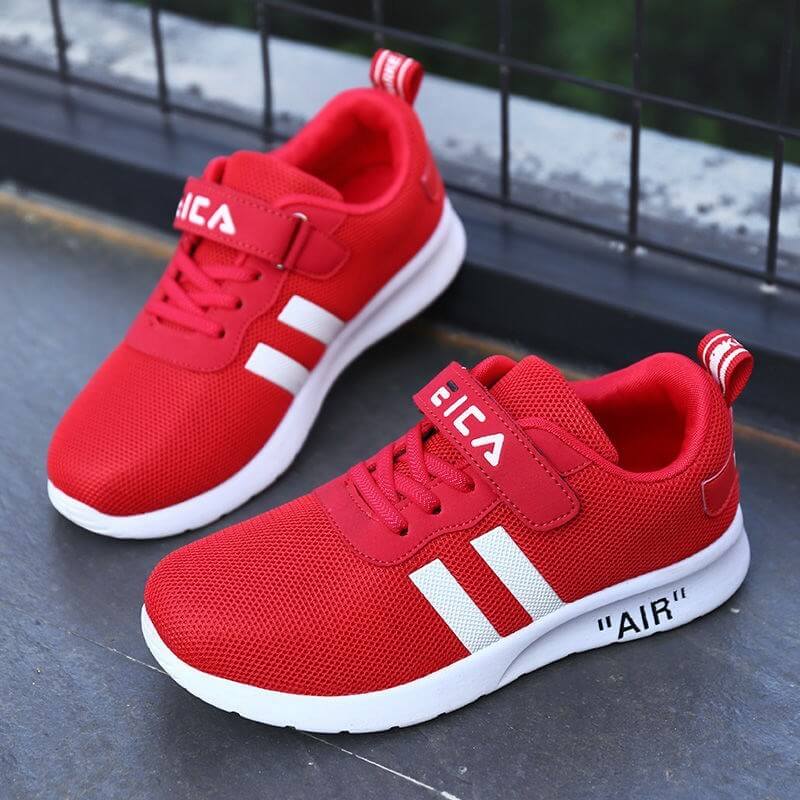 Children's red sports shoes with white stripes and adjustable strap, perfect for casual wear and active play.