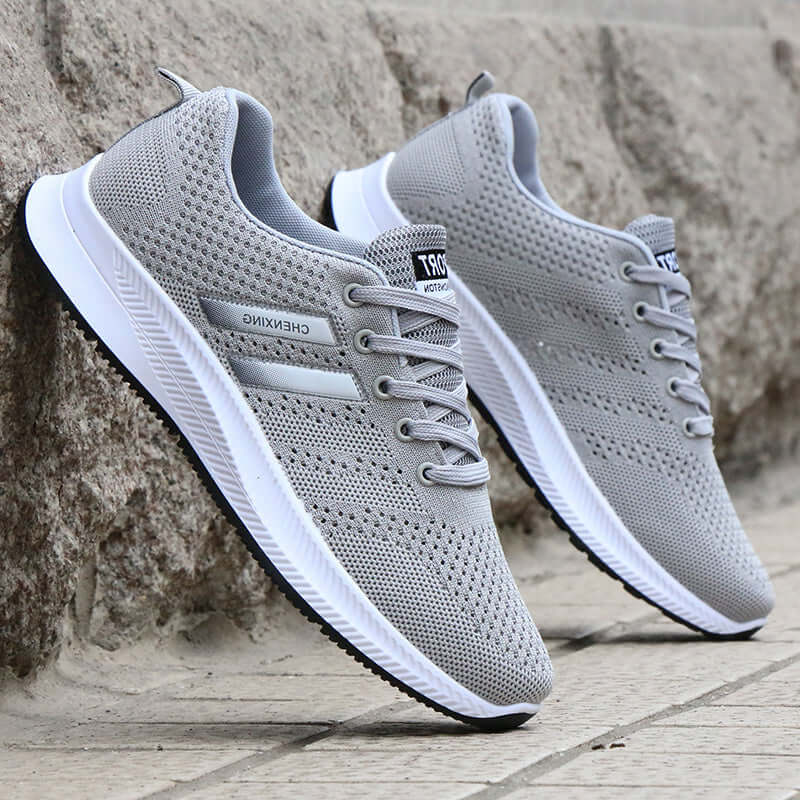 Breathable mesh casual sports shoes for men, gray color, non-slip running shoes by BONEHEAD PRO-CREATIONS.