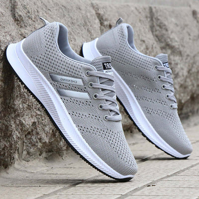 Breathable mesh casual sports shoes for men, gray color, non-slip running shoes by BONEHEAD PRO-CREATIONS.