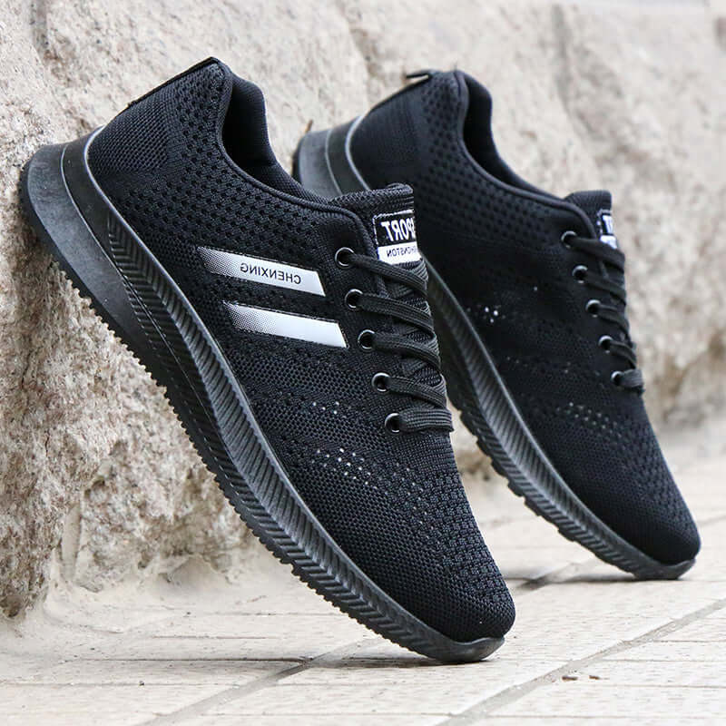 Breathable black mesh sports shoes for men, non-slip and casual design by BONEHEAD PRO-CREATIONS.