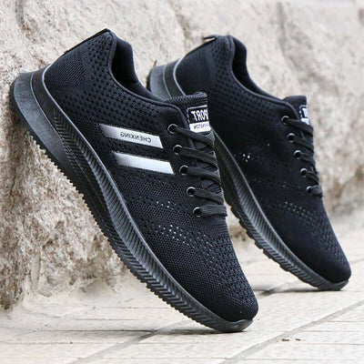 Breathable black mesh sports shoes for men, non-slip and casual design by BONEHEAD PRO-CREATIONS.