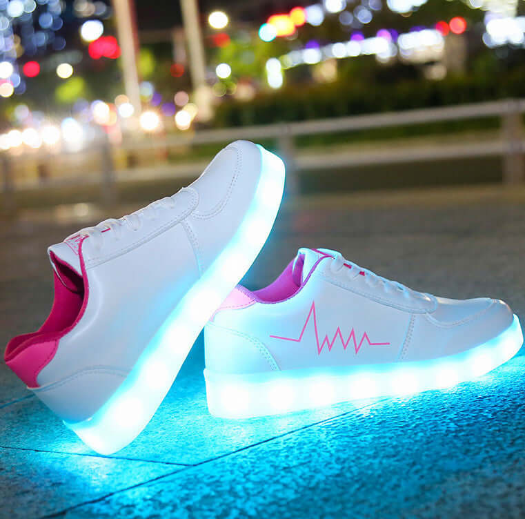 Luminous USB charging LED flash shoes for women by BONEHEAD PRO-CREATIONS with a stylish pulse design and bright blue glow.