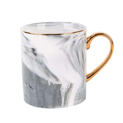 Stylish marble coffee mug in ceramic with a gold handle, perfect for hot beverages, 301-400ml capacity.
