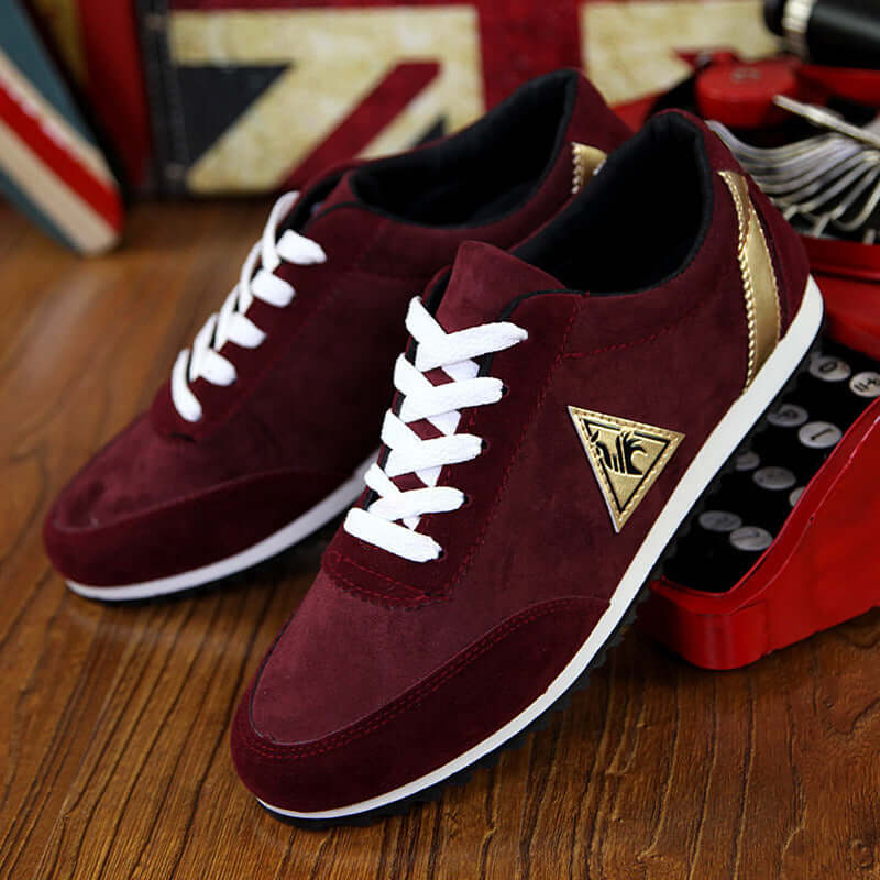 Stylish maroon Rooster shoes with suede finish, white laces, and gold accents, perfect for casual wear from BONEHEAD PRO-CREATIONS.