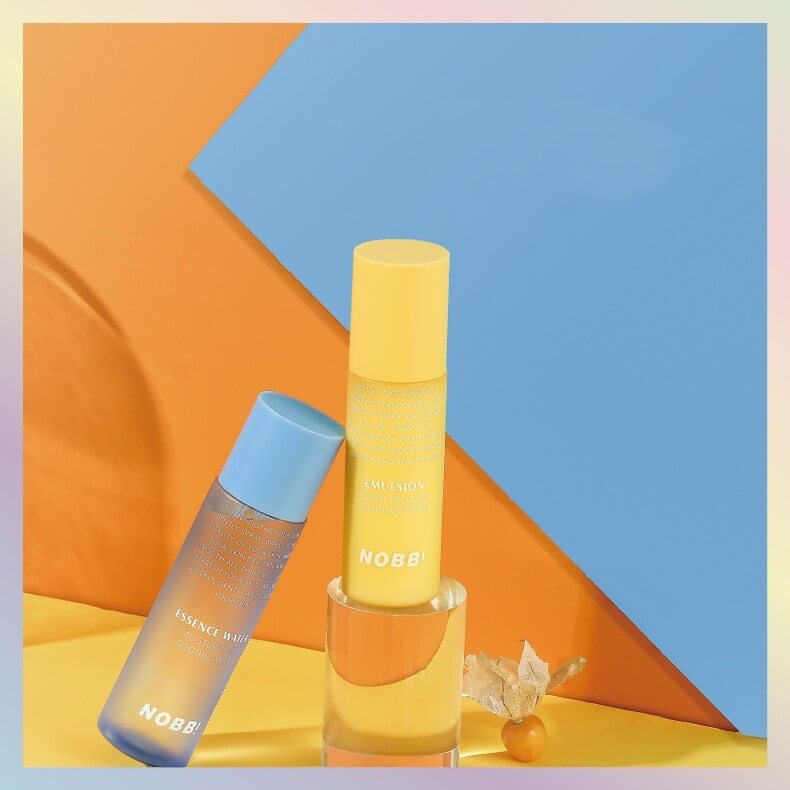 Moisturizing Water and Essence Milk products displayed with vibrant background, highlighting moisturizing benefits and vitamin C.