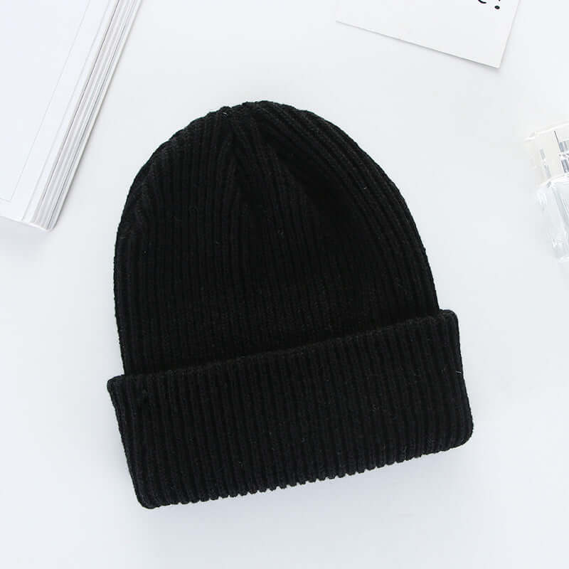 Black wool knit cap by BONEHEAD PRO-CREATIONS, perfect for men's and women's curling fashion.