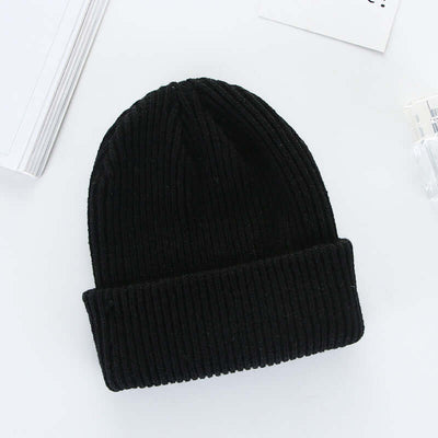 Black wool knit cap by BONEHEAD PRO-CREATIONS, perfect for men's and women's curling fashion.