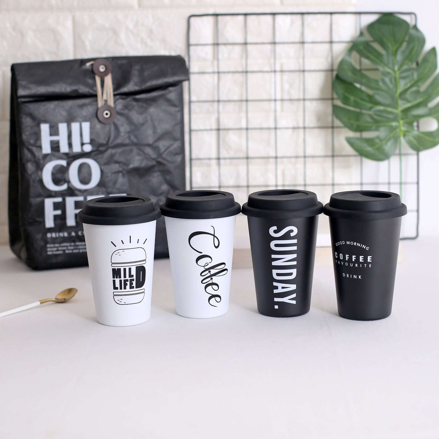 ROKEN stainless steel cups with lids and straws, creative designs in various colors for coffee and drinks.
