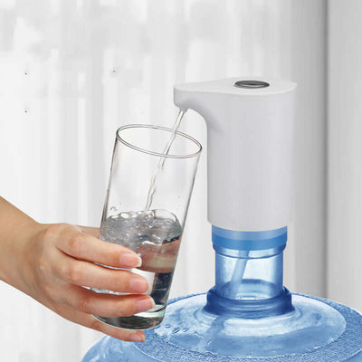 Electric water pump dispensing water into a glass, ideal for bottled water; USB powered, rated 3.8V, ABS plastic.