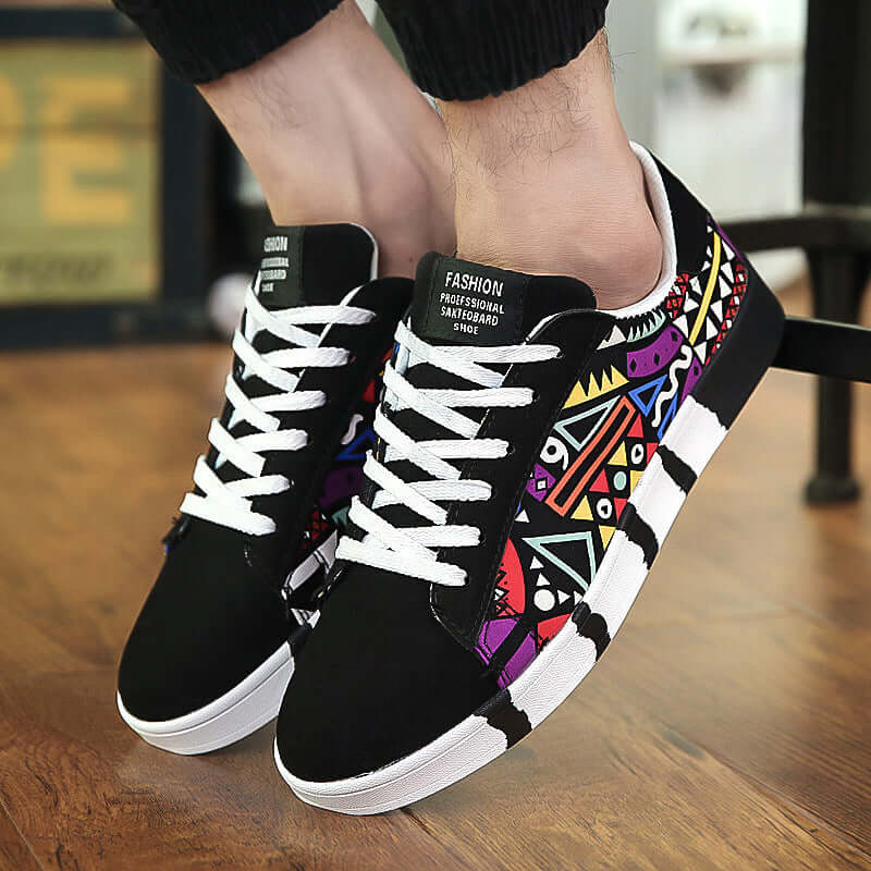 Trendy canvas shoes with colorful geometric pattern, perfect for casual wear and skateboarding.