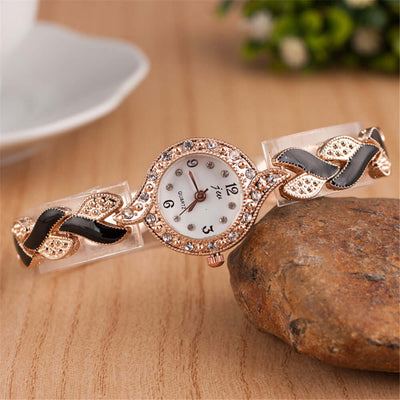 Trendy quartz watch by BONEHEAD PRO-CREATIONS featuring a multi-color design and elegant embellishments.