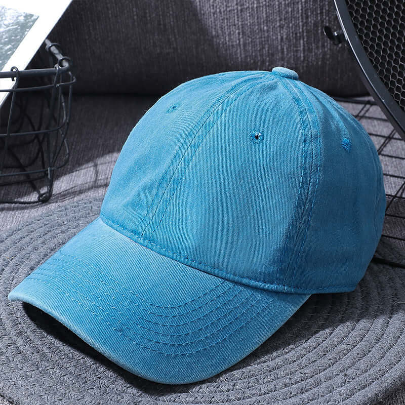 Washed blue baseball cap for men and women by BONEHEAD PRO-CREATIONS, perfect for outdoor activities and casual wear.