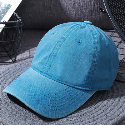 Washed blue baseball cap for men and women by BONEHEAD PRO-CREATIONS, perfect for outdoor activities and casual wear.