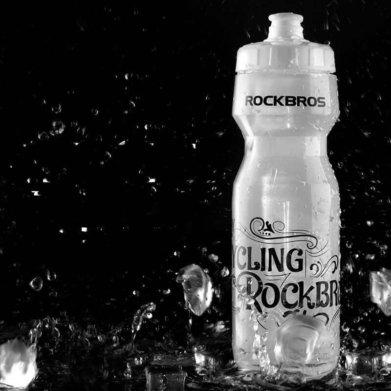 Cycling water bottle by ROCKBROS featuring a transparent design, ideal for mountain and road biking, with water splashes.