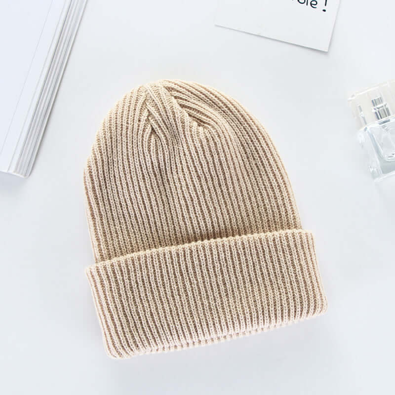 Knit cap in beige, made from wool, perfect for men's and women's curling fashion by BONEHEAD PRO-CREATIONS.