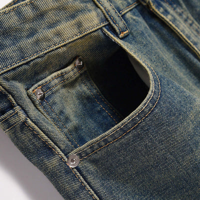 Close-up of dark blue denim men's pocket jeans showcasing unique pocket design and quality stitching for style and practicality.