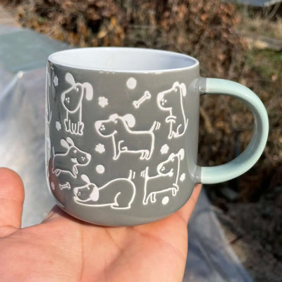 Chubby little dog ceramic mug with playful designs, perfect for dog lovers, 340ml capacity.