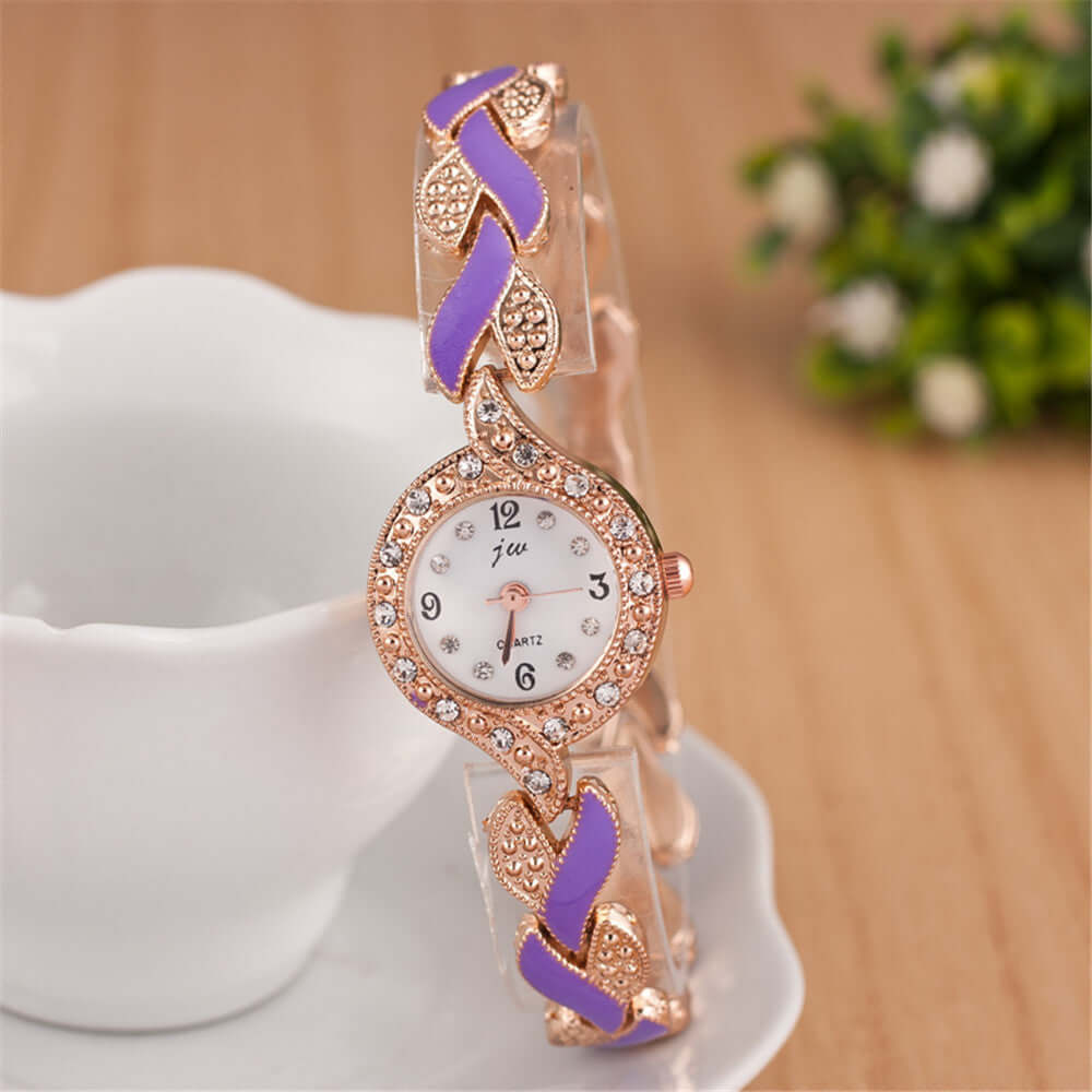 Trendy leaf bracelet quartz wrist watch by Bonehead Pro-Creations, featuring a multi-color design and elegant rose gold accents.