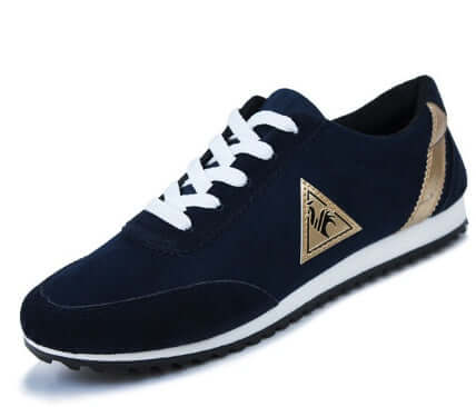 Casual men's cock shoes in navy suede with white laces and gold accents from BONEHEAD PRO-CREATIONS.