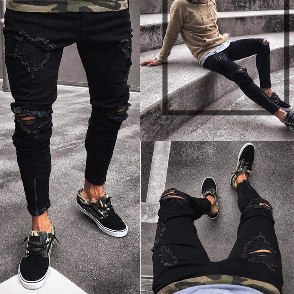 Men's trendy black ripped jeans styled with casual sneakers, perfect for leisure and fashion-forward looks.