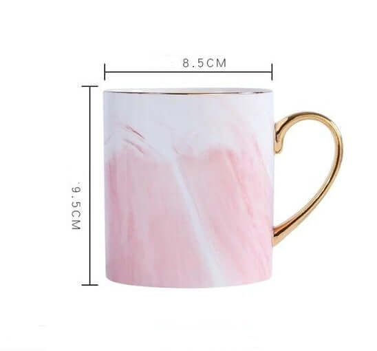 Elegant pink marble coffee mug with gold handle, ceramic material and 301-400ml capacity, 9.5cm tall.