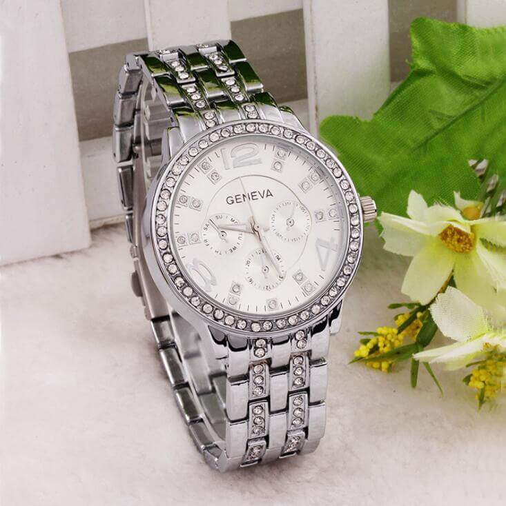 Exquisite rhinestone wrist watch by BONEHEAD PRO-CREATIONS, quartz movement, 42mm dial, stylish silver strap.