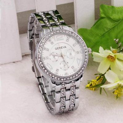 Exquisite rhinestone wrist watch by BONEHEAD PRO-CREATIONS, quartz movement, 42mm dial, stylish silver strap.