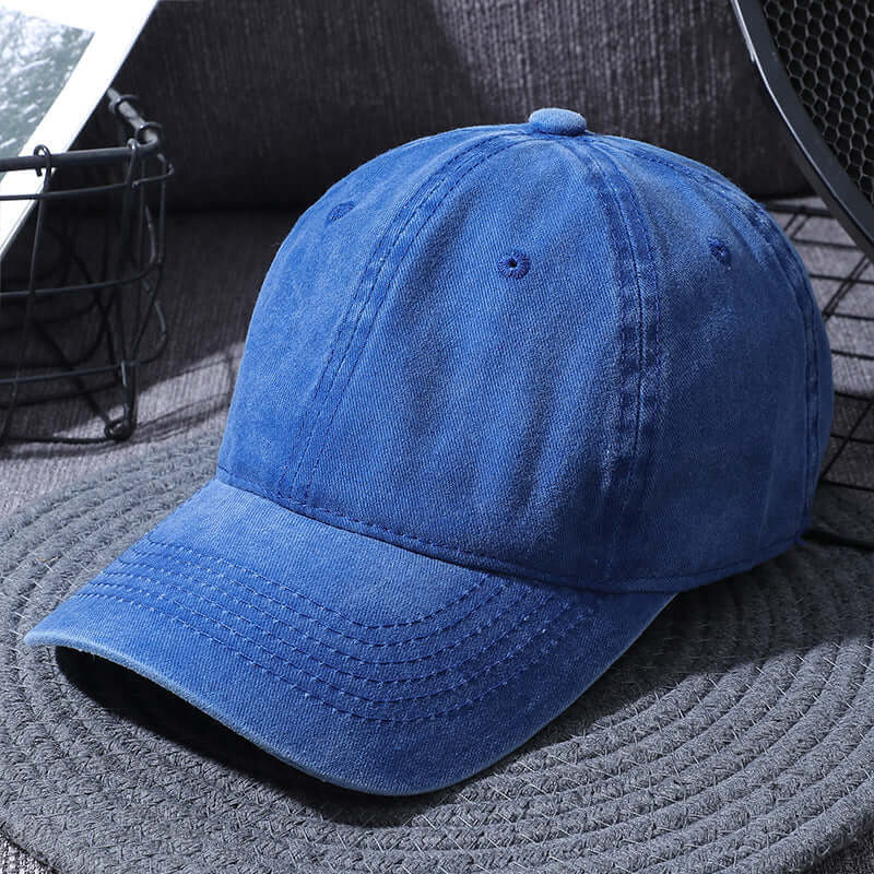 Washed blue baseball cap from BONEHEAD PRO-CREATIONS for men and women, perfect for outdoor activities and casual wear.