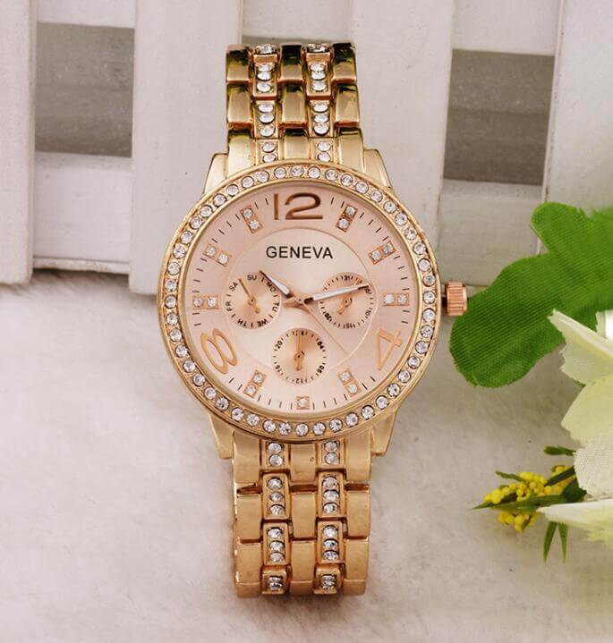 Exquisite rhinestone wrist watch by BONEHEAD PRO-CREATIONS with quartz movement, 42mm dial, and a stunning gold finish.