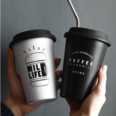 ROKEN stainless steel mugs with lids and straws in silver and black, perfect for coffee, outdoor, and leisure use.