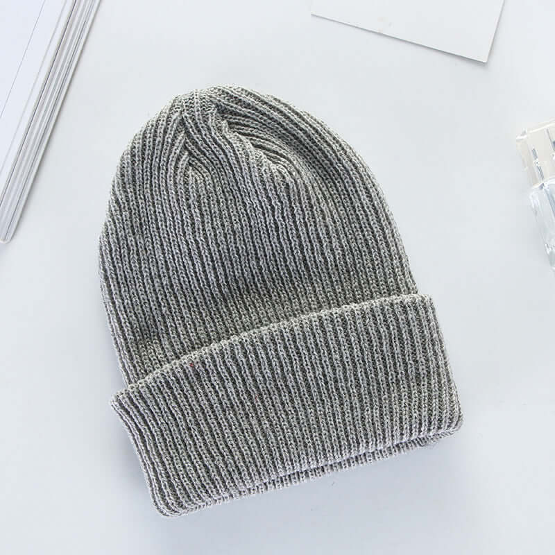 Men's and women's knit cap in grey, made of wool by BONEHEAD PRO-CREATIONS, perfect for curling fashion.