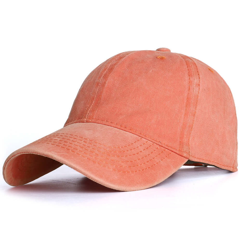 Washed baseball cap in orange, unisex design, ideal for outdoor wear, by BONEHEAD PRO-CREATIONS, curved brim, retro style.