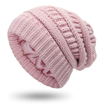 Women's warm pink woolen knit satin hat ideal for protective hairstyles by BONEHEAD PRO-CREATIONS, perfect for autumn and winter.