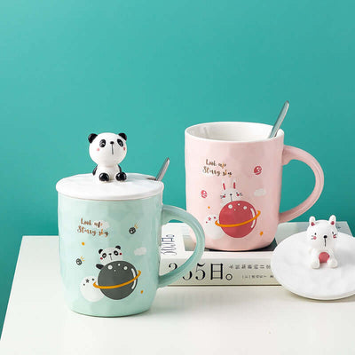 Creative ceramic animal cartoon mugs with panda and planet designs, perfect for home use. Ideal gift for all ages.