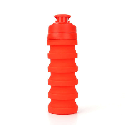 Collapsible outdoor water bottle in bright red, made from BPA-free materials, featuring a compact design for travel.