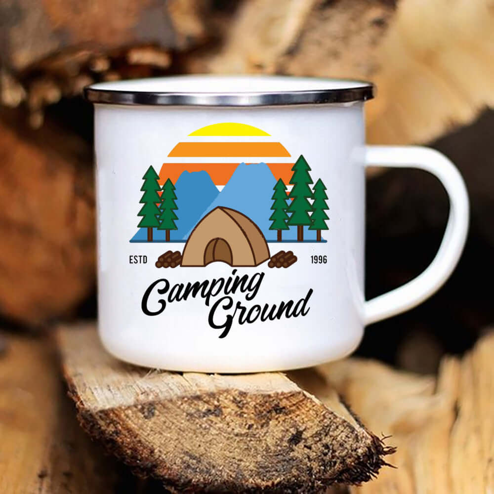 Ceramic camping mug with colorful mountain and tent design, perfect for outdoor adventures and household use.