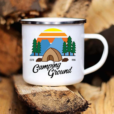 Ceramic camping mug with colorful mountain and tent design, perfect for outdoor adventures and household use.
