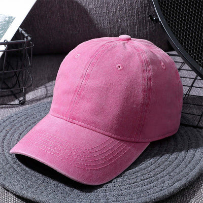 Washed pink baseball cap for men and women by BONEHEAD PRO-CREATIONS, outdoor distressed sun hat, cotton material.