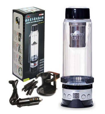 Heating car water heater thermos cup with power base, cup holder, and accessories in packaging.