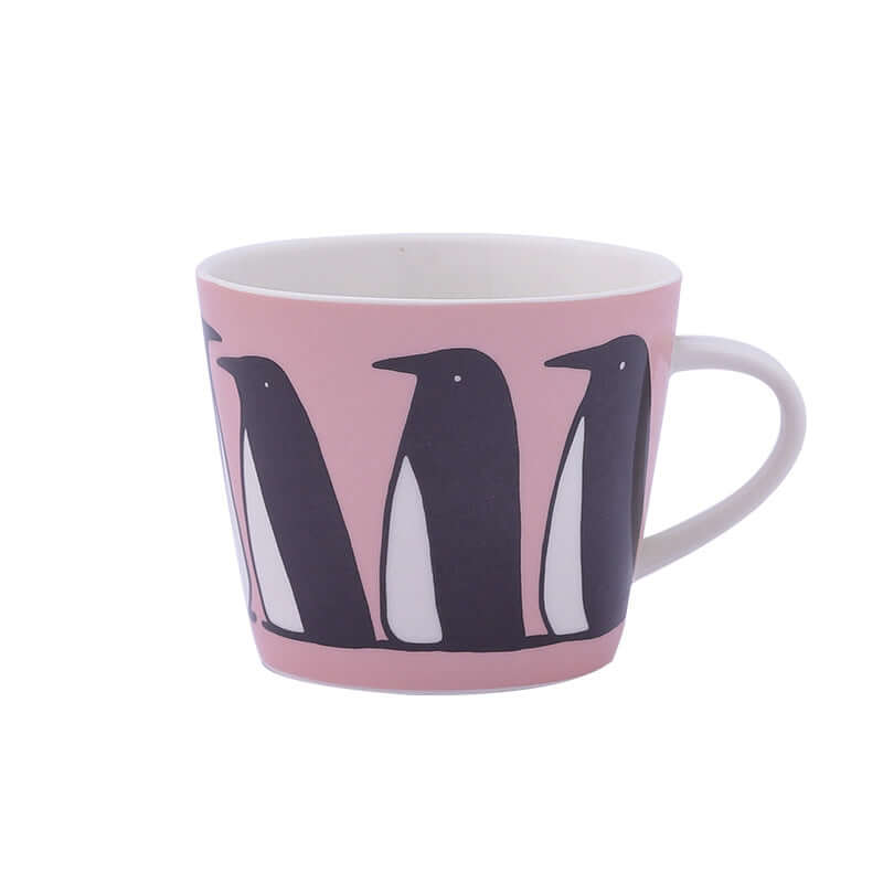 Ceramic pink coffee mug featuring playful penguin designs, perfect for animal lovers.