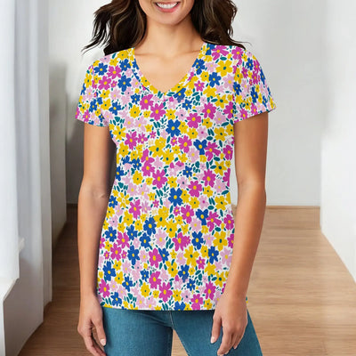Womens V-neck floral top from BONEHEAD PRO-CREATIONS featuring vibrant colors, perfect for casual or office wear.
